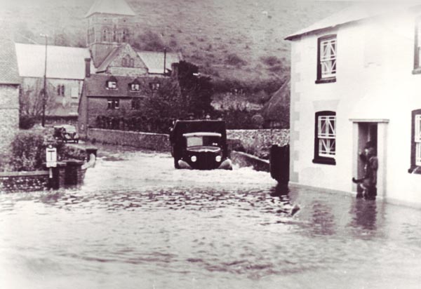 Truck makes its way down Church Street during flood in 1950s