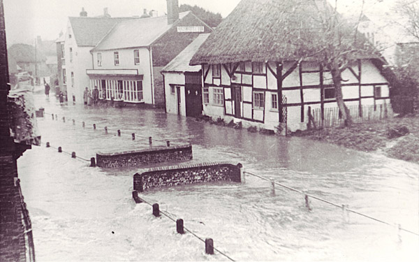 White Cottage and Parson's shop in flood