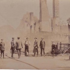 Another view, showing the smouldering ruins