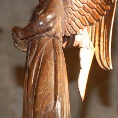 Angel Carved angel which adorns the lectern, one of Ninian Comper's addition to the church.