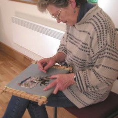 Anne Hutchings, expert embroideress Anne Hutchings, expert embroideress.