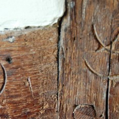 Builders marks Marks left by the builders in the 16th century structure.