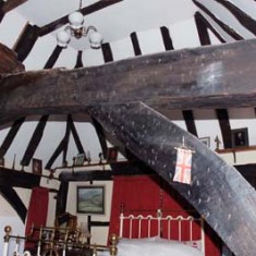 Forge Sound passing trusses, upstairs Upstairs room in which the construction of the roof beams has been exposed, showing the sans purlin framework.