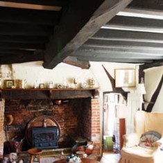 Forge Sound sitting room with inglenook fireplace Sitting room with inglenook fireplace (likely to have been installed in the 17th century).