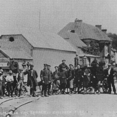 After the fire; Petersfield Fire Brigade, policemen and boy scouts