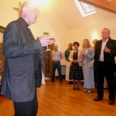 Vicar speaking at party The Reverend Terry Louden thanks those who participated in the Embroidery.