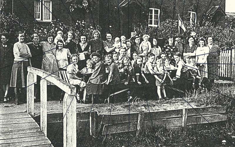VE Day party, group by the river.
