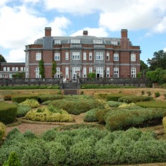 Leydene from south with garden pattern. The main house was converted into luxury apartments, and the mews into houses.