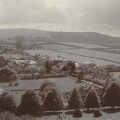 View of western end of EM from Church spire (pre-vicarage and Hyde cottages) View from the church spire, or from Park Hill. No buildings along The Hyde and only the older ones along Workhouse Lane, although the Institute (1884) has been built.