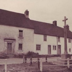 Barnards with five doors and War Memorial. The Memorial was built in 1923 and there are still five doors in the three dwellings.