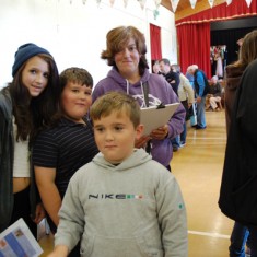 Family doing quiz Children were invited to complete a quiz with questions based on the Historic Houses display.