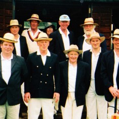 Cricket team colour A team in the 1990s, including Jane Sims, tea maker, at the very back, Bill Tyrwhitt Drake, back row second from left, Frank Wheeler, back row extreme right, Dominic Carney, front row right, Alan Blackman third from right, front.