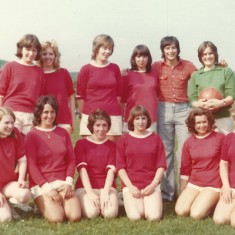 East Meon Women's soccer team, Portsmouth City footballer Peter Marinello in back row. Left to right, Sharon Brown, Pat Elliott, Julie Cannings, Diane Adams, P.M., Fiona Tindell, Joan Blackman, front row, Mary Crockford, Joyce Colbourne, Dawn Adams, Brenda Kirby, Mrs Whiteley and Julie Goddard. Pam Sparrow also played, but took the photo.