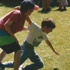 Pair falls in three-legged race Pair falls in three-legged race