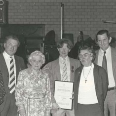 Presentation by Atkinsons to Ginger Phillips Presentation by Atkinsons to farm hand Ginger Phillips. L to R, Eileen A, Wilson A, Sarah (Wilson's mother), Ginger Phillips with certificate, Kate, Michael and Jane Atkinson