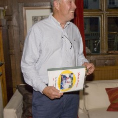 Chris Brough, the founding editor, with the presentation booklet