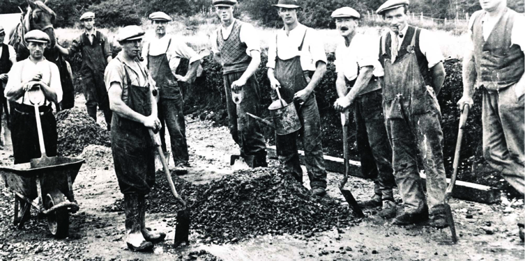 Leydene gardeners building the driveway, c 1930. Jack Cook is fourth from left in the front row.
