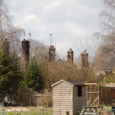 Allotments and chimney stacks Aftermath of fire at Hockey and Brook Cottages,March 2013 | Michael Blakstad