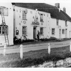 Barnards being docorated with bunting for the Coronation, 1953