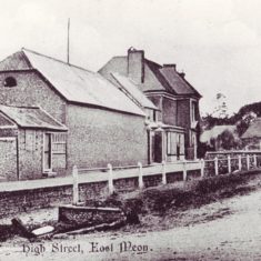 Glenthorne postcard East Meon High Street looking east, probably early 20th century. The small hut on the left was a kiosk where a fishmonger from Winchester sold his wares once a week, then the barn of what was Coles' dairy, then the Gaite House where Coles operated his shop, then Glenthorne House. Tilbury's shop, later Adams and then Savage & Parsons is on the other side of the street.