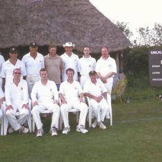 Cricket team on tour in Chumleigh and scoreboard Cricket team on tour in Chumleigh and scoreboard