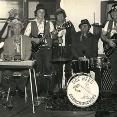 Doc Weed and the Corncrunchers. Doc Weed and the Corncrunchers. L - R Geoff Marshall, David Goddard, Robby Hamilton, Noel Stone, (Coalman, West Meon) John Mundy, Les Blackman